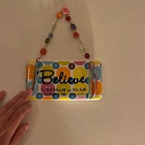 A cute piece to hang on the wall, bathroom, really anywhere with a cute quote.